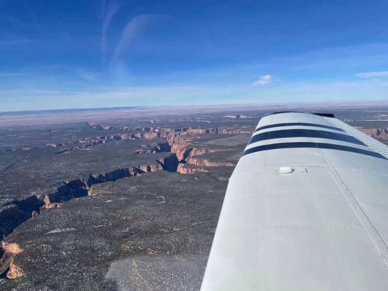 View along the wing over red rock canyon country